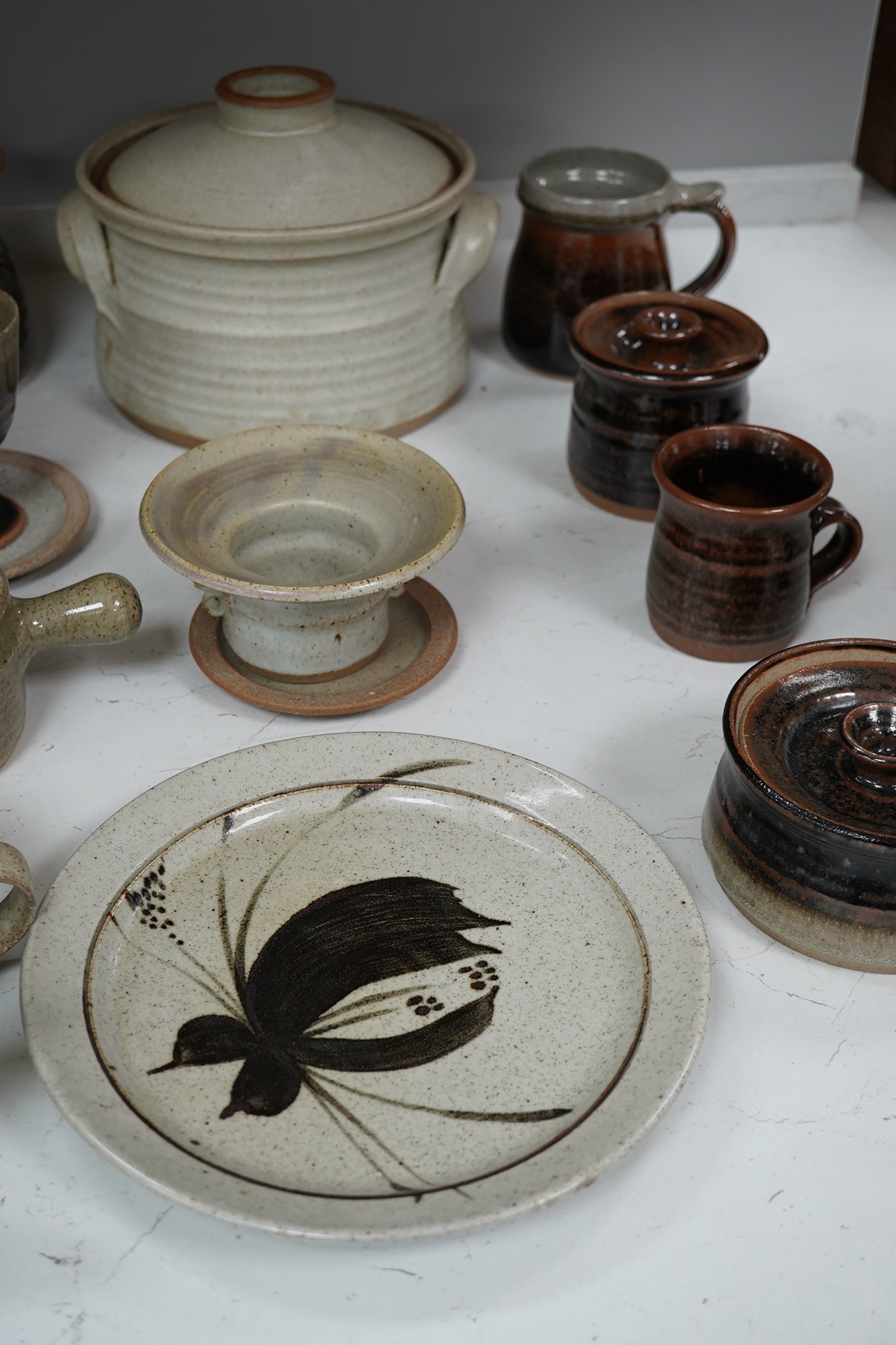 A large collection of Studio ceramics by John Davidson, Truro Pottery, largest item casserole pot and cover 20cm high (31). Condition - teapot has cover missing, but rest mostly good